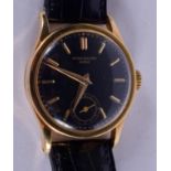 A RARE 18CT GOLD PATEK PHILIPPE BLACK DIAL WRISTWATCH with 18ct gold strap. Dial 3 cm diameter, Stra