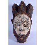 AN AFRICAN TRIBAL POLYCHROMED MASK. 35 cm x 16 cm.