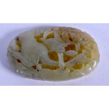AN EARLY 20TH CENTURY CHINESE CARVED JADE BIRD PLAQUE. 5 cm x 3 cm.