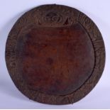 AN AFRICAN TRIBAL DIVINATION CARVED WOOD PLATE. 40 cm x 43 cm.