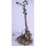 A RARE LARGE 19TH CENTURY SILVER PLATED GIRAFFE TABLE LAMP modelled upon a naturalistic outcrop. 54