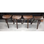 FOUR STYLISH VINTAGE THREE LEGGED CUTLERS STOOLS. 51 cm x 39 cm. (4)