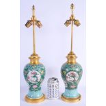A PAIR OF MID 19TH CENTURY CHINESE FAMILLE ROSE PORCELAIN VASES converted to lamps. Vase 21 cm high,