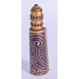 A VINTAGE MIDDLE EASTERN ENAMELLED SCENT BOTTLE. 7.25 cm high.