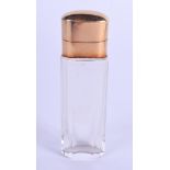 AN ANTIQUE 18CT GOLD MOUNTED CRYSTAL GLASS SCENT BOTTLE. 9 cm high.