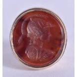 AN EARLY GOLD MOUNTED CARVED STONE CAMEO RING possibly Antiquity. 16.2 grams. P.