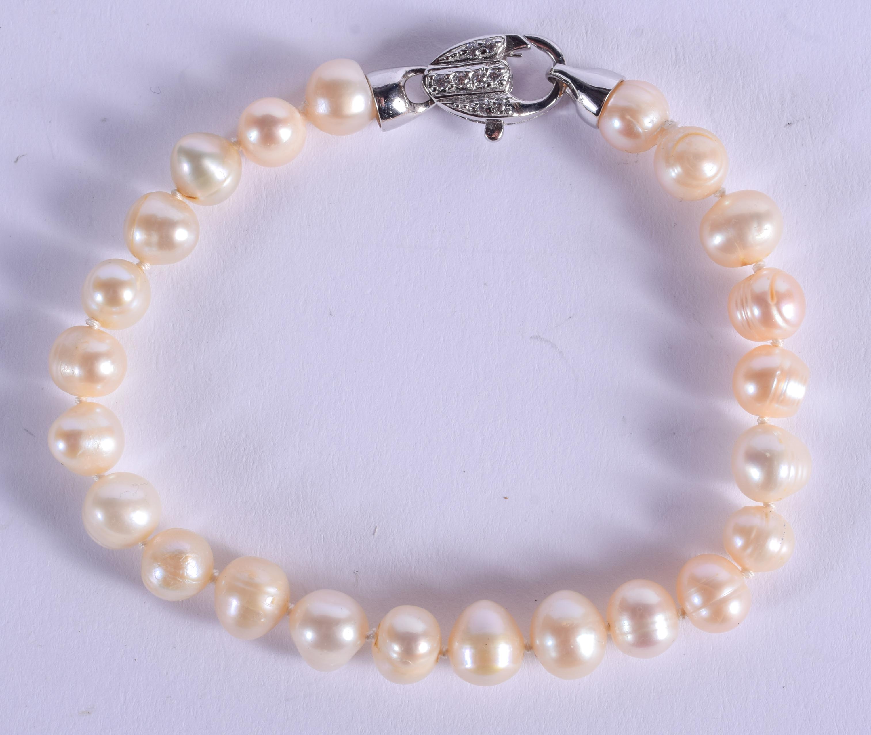 A SILVER MOUNTED PEARL BRACELET. 17 cm long.