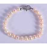 A SILVER MOUNTED PEARL BRACELET. 17 cm long.