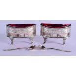 A PAIR OF VICTORIAN SILVER SALTS. Sheffield 1878& 1889. Silver 99 grams. 8 cm wide. (4)