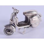 A SILVER VESPA BIKE. 4.5 cm x 2.25 cm.