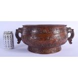 A LARGE CHINESE TWIN HANDLED BRONZE CENSER 20th Century, bearing Xuande marks to base, decorated wit