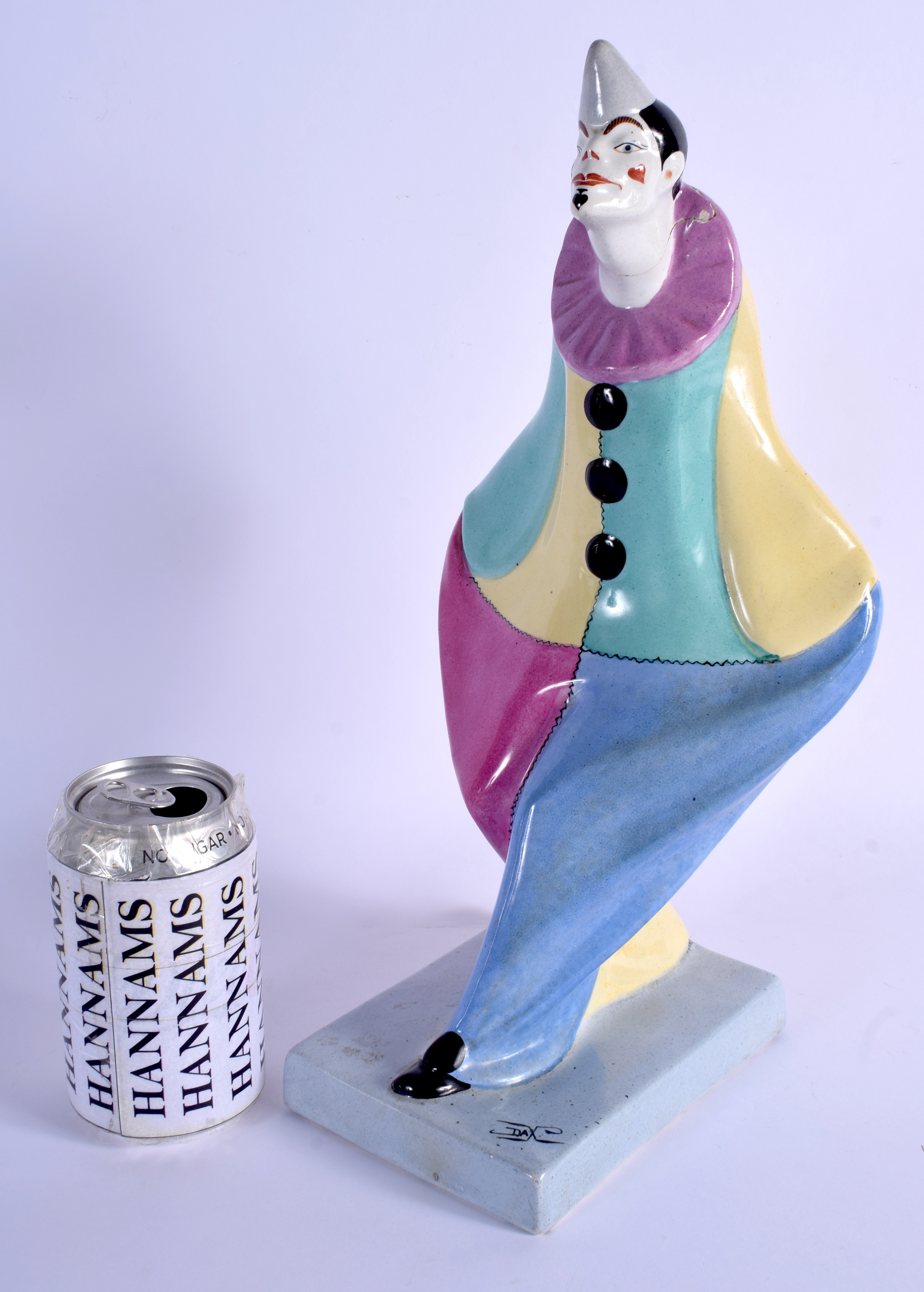 AN ART DECO FRENCH DAX POTTERY FIGURE OF A CLOWN. 35 cm high.