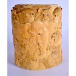 A 19TH CENTURY JAPANESE MEIJI PERIOD CARVED IVORY TUSK VASE AND COVER decorated with animals. 12 cm