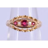 AN 18CT GOLD AND RUBY RING. K. 2.4 grams.
