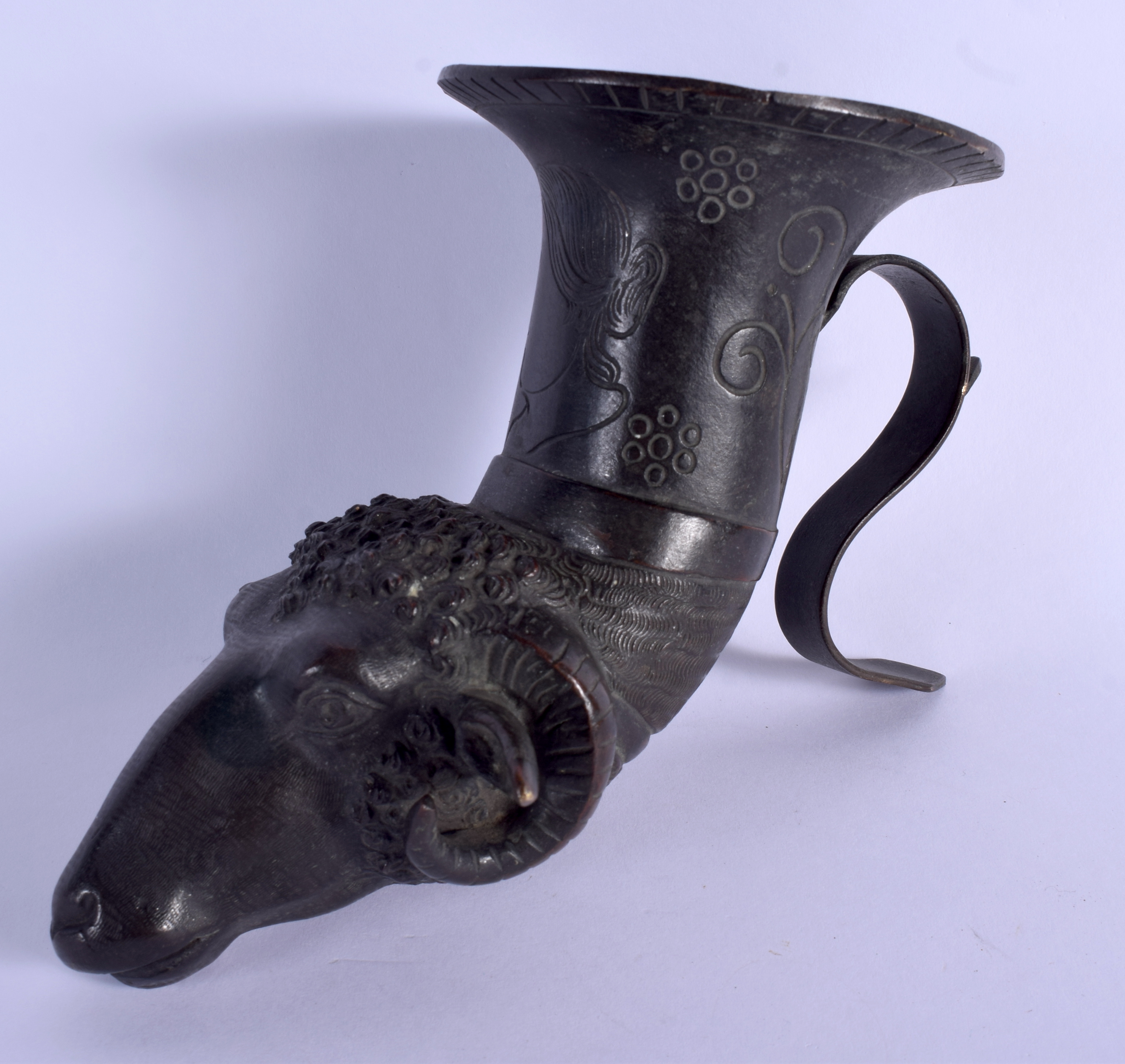 A RARE 19TH CENTURY ITALIAN GRAND TOUR BRONZE RHYTON DRINKING CUP formed with a rams head. 16 cm x 8