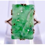 AN ANTIQUE 18CT GOLD AND CHINESE JADEITE RING. 4.8 grams. R/S. Jadeite 2 cm x 1 cm.