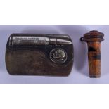 AN AMERICAN SILVER PLATED AMMO VETERAN BUCKLE together with a treen whistle. Largest 10 cm x 5 cm. (