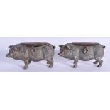 A PAIR OF ANTIQUE CONTINENTAL PIG MONEY BOXES with padlocks. 13 cm x 7 cm.