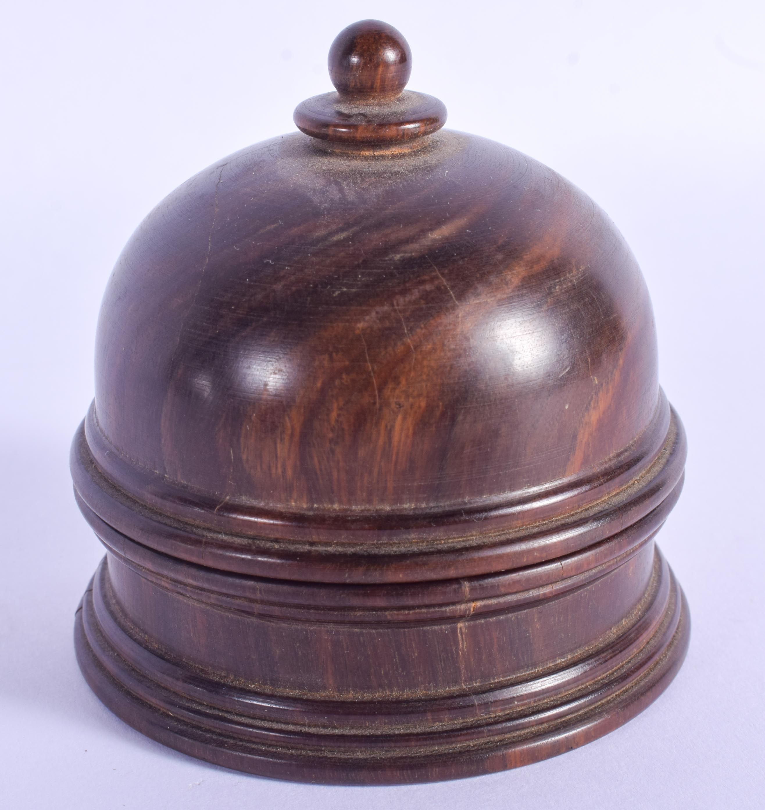 AN EARLY 20TH CENTURY CONTINENTAL CARVED IVORY SPINNING GLOBE within a fitted treen box and cover. I