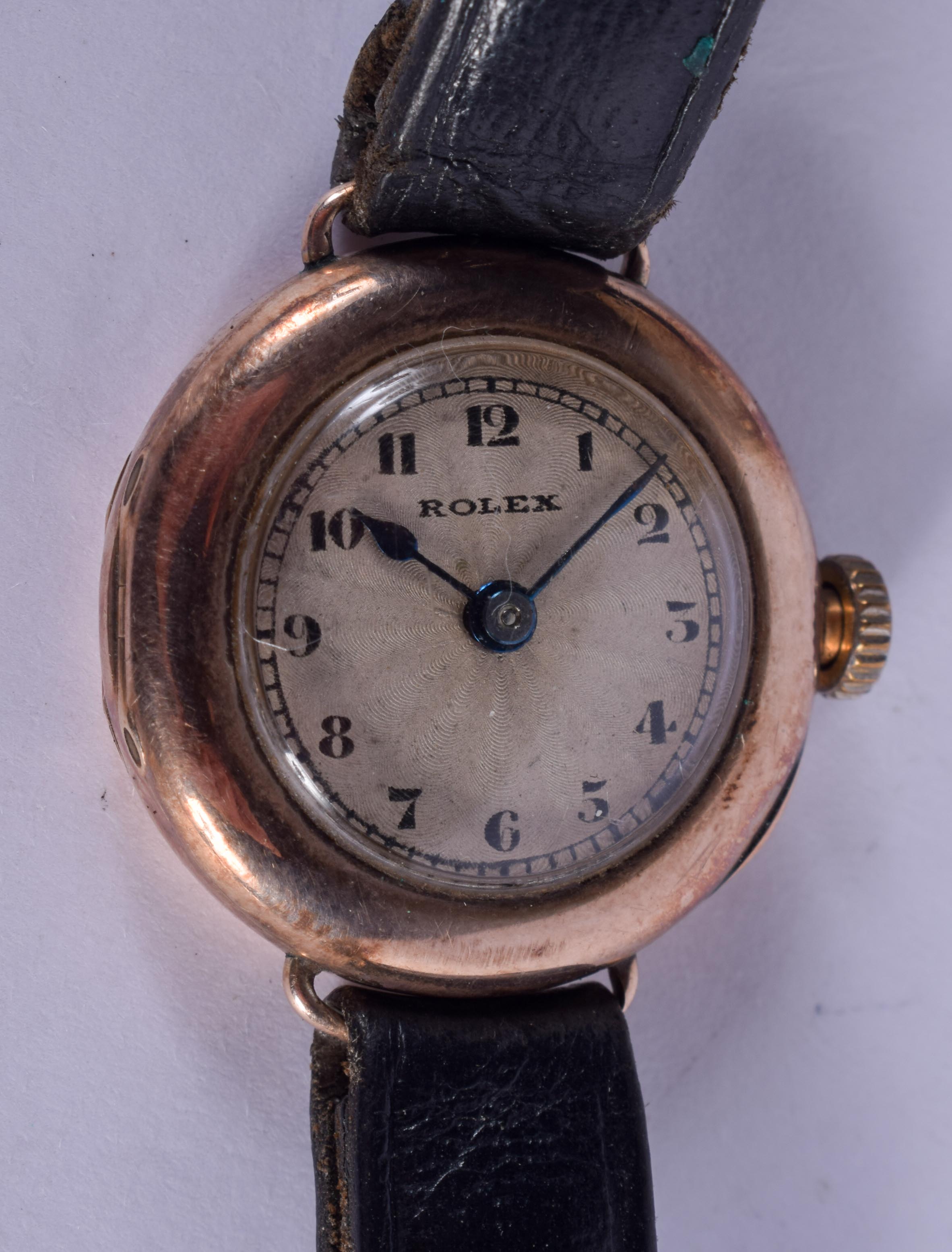 A VINTAGE 9CT GOLD ROLEX HALF HUNTER LADIES WRISTWATCH. 2.5 cm diameter.