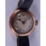 A VINTAGE 9CT GOLD ROLEX HALF HUNTER LADIES WRISTWATCH. 2.5 cm diameter.