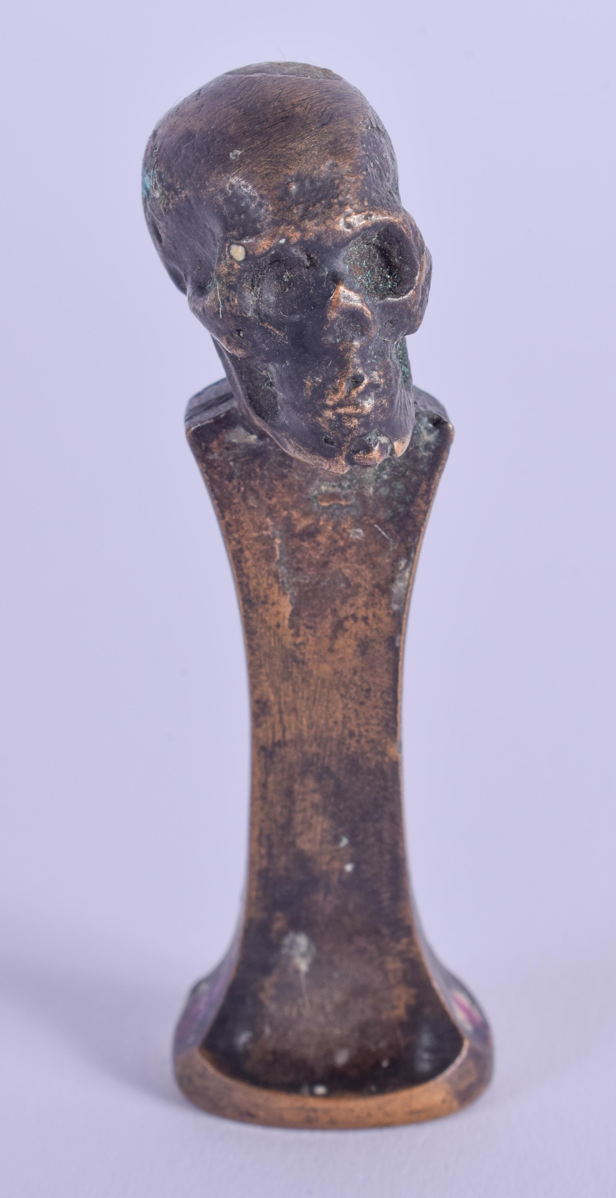 A CONTEMPORARY SS SKULL BRONZE SEAL. 5.5 cm high.