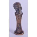 A CONTEMPORARY SS SKULL BRONZE SEAL. 5.5 cm high.