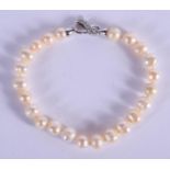 A SILVER MOUNTED PEARL BRACELET. 20 cm long.