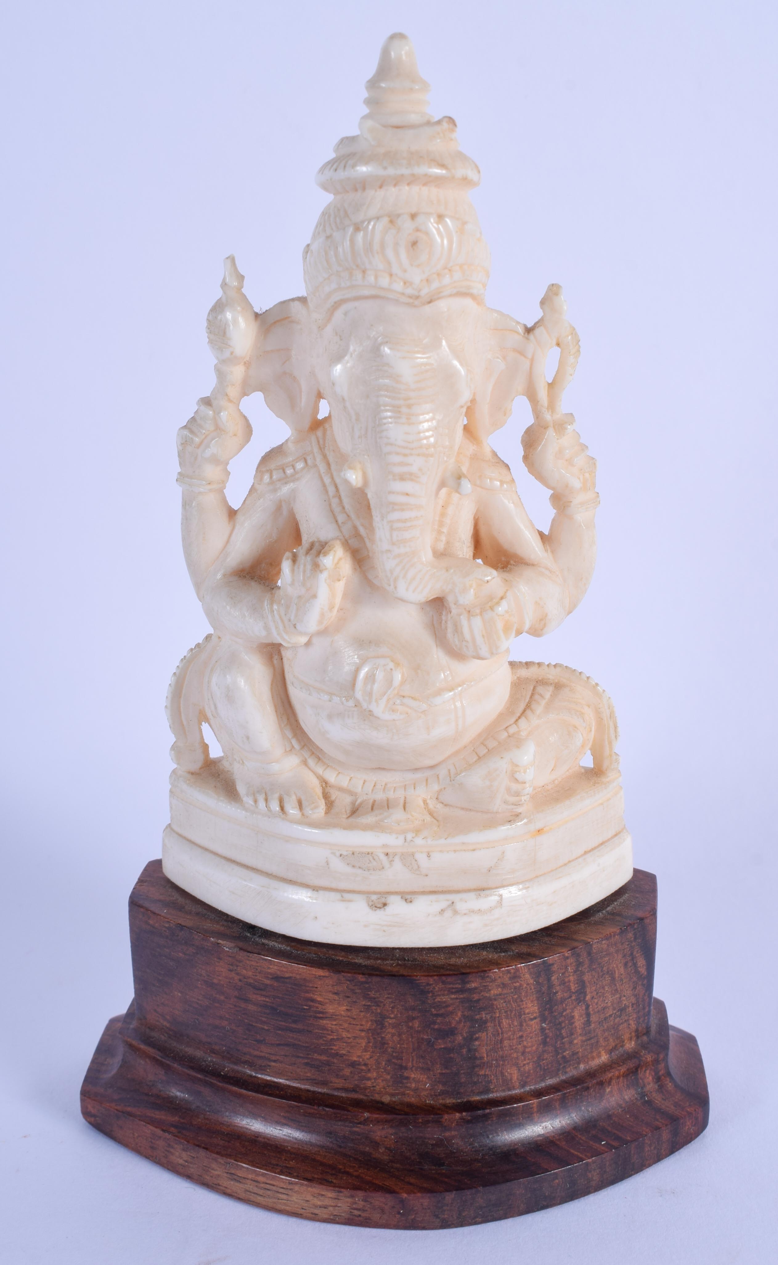 A 19TH CENTURY ANGLO INDIAN CARVED IVORY FIGURE OF GANESHA. Ivory 10 cm x 4 cm.