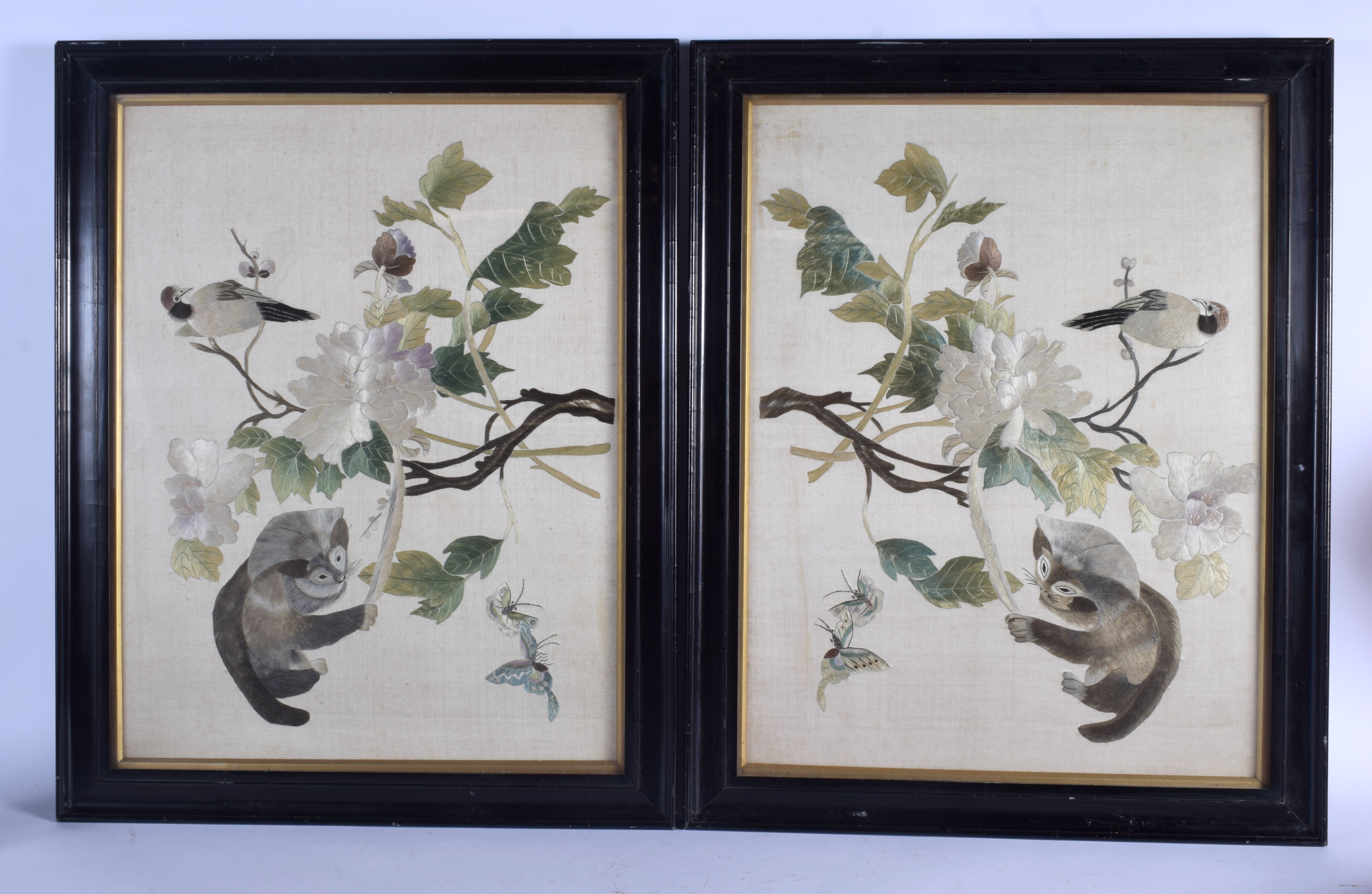 A RARE PAIR OF 19TH CENTURY CHINESE SILK EMBROIDERED PANELS depicting red panda and butterflies. Ima