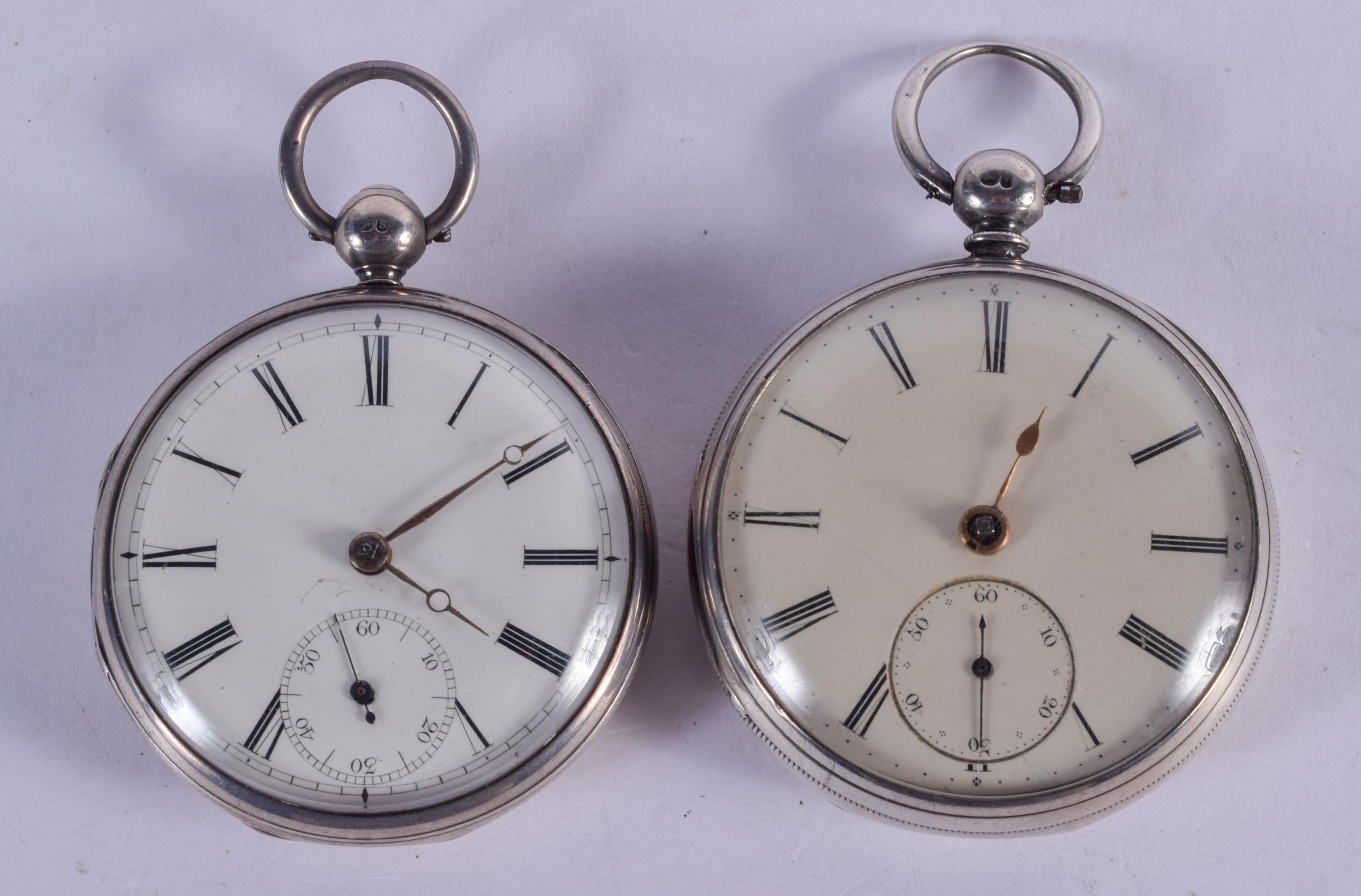 TWO ANTIQUE SILVER POCKET WATCHES. 5 cm diameter. (2)