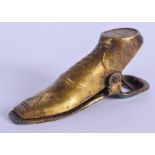 A RARE EDWARDIAN BRASS BOOT LETTER CLIP. 8 cm x 3 cm.