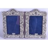 A PAIR OF SILVER PHOTOGRAPH FRAMES. 20 cm x 14 cm.