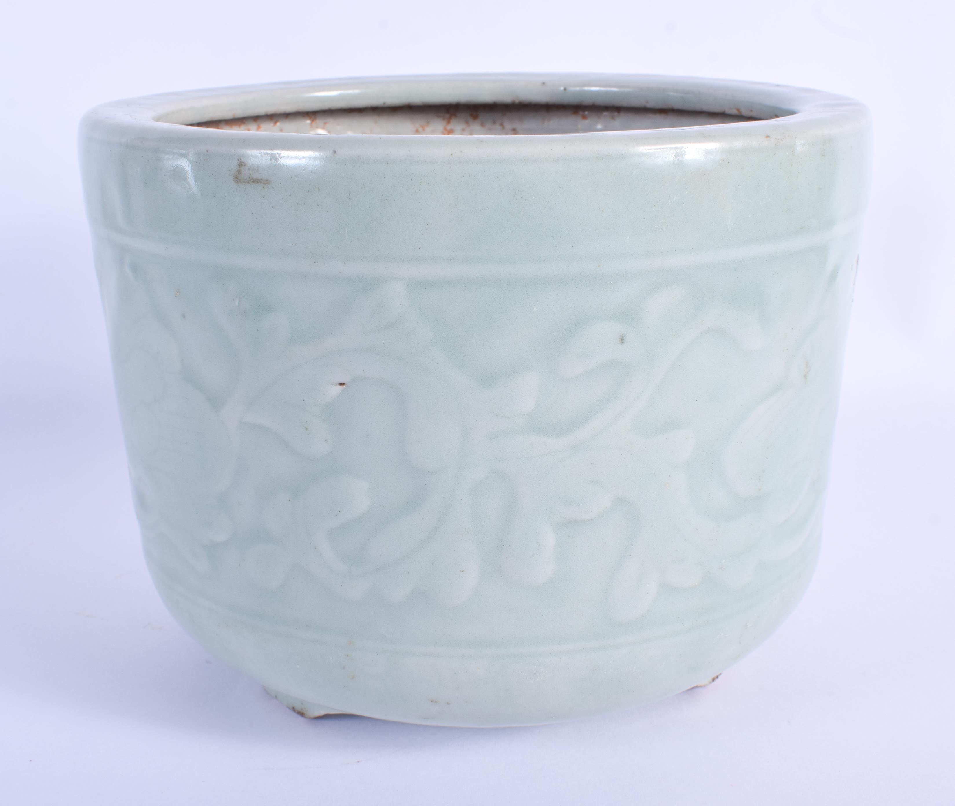 A 19TH CENTURY CHINESE CELADON PORCELAIN JARDINIERE Qing, decorated with foliage. 18 cm x 13 cm. - Image 2 of 3