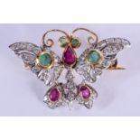 AN ANTIQUE GOLD DIAMOND RUBY AND EMERALD BUTTERFLY BROOCH. 2.3 grams. 2 cm x 1.5 cm.