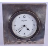 A MODERN SILVER CARR DESK CLOCK. 10.25 cm square.