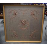 A LARGE EARLY 20TH CENTURY CHINESE FRAMED EMBROIDERED DRAGON PANEL. Image 115 cm x 113 cm.