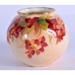 Royal Worcester spirally moulded globular vase painted unusually painted with a flowering vine by Ki