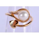 AN 18CT GOLD AND PEARL RING. 3.4 grams. K.