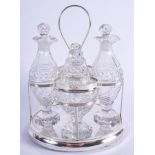 A GEORGE III SILVER FOUR PIECE SILVER CRUET SET by Matthew Boulton, of almost neo classical design.