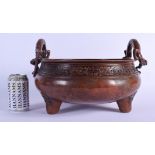 A LARGE CHINESE TWIN HANDLED BRONZE CENSER 20th Century, bearing Xuande marks to base, decorated wit