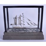 A CASED 1950S CHINESE SILVER FILIGREE BOAT. Silver 15 cm x 12 cm.