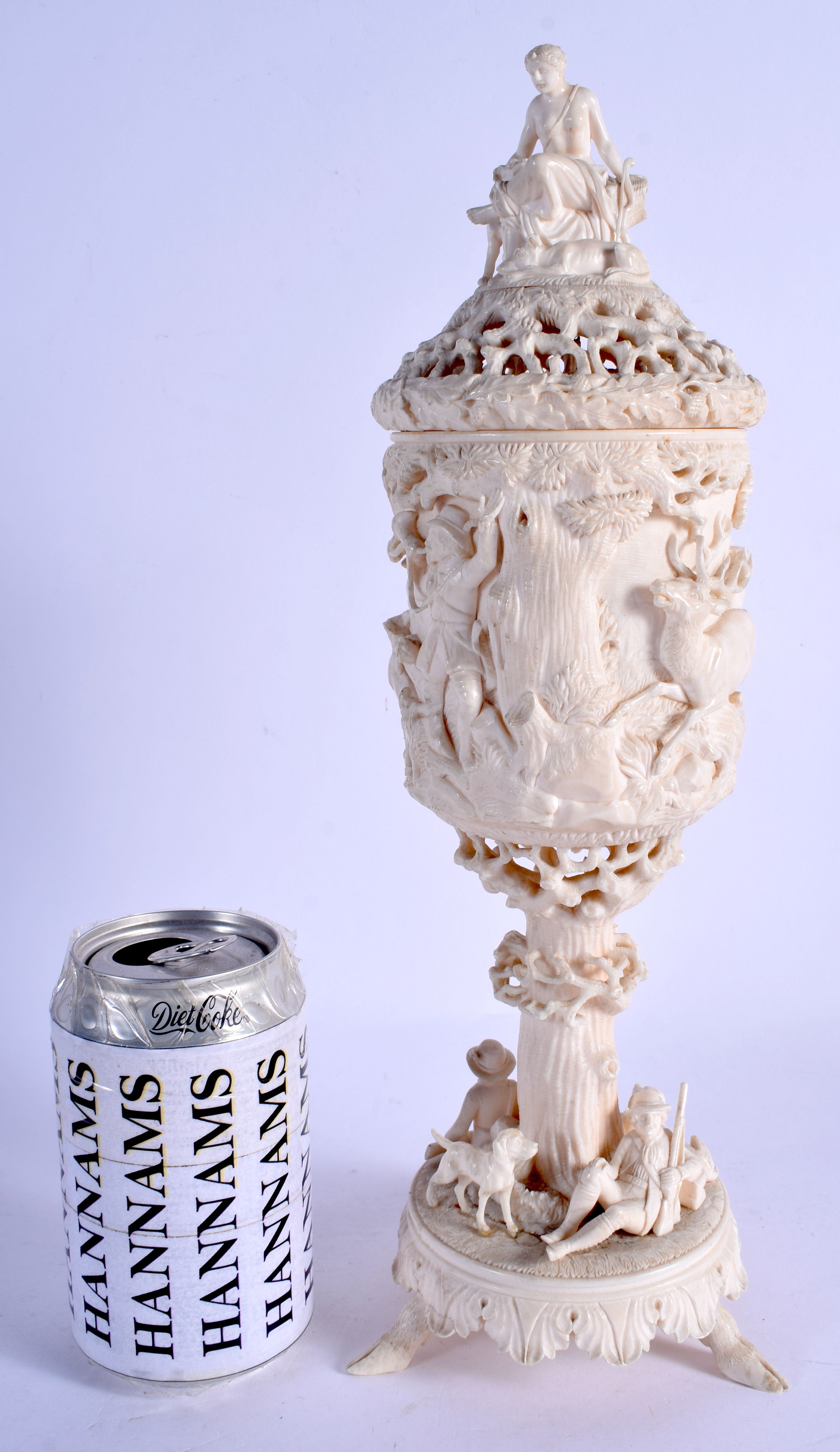 A RARE LARGE 19TH CENTURY EUROPEAN CARVED DIEPPE IVORY VASE AND COVER decorated with figures and due