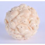 AN EARLY 20TH CENTURY JAPANESE MEIJI PERIOD CARVED IVORY RAT BALL OKIMONO modelled clambering. 4.25