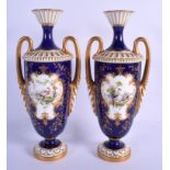 Royal Worcester good pair of vases painted with exotic birds in landscape in the manner of George Jo