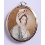 AN 18TH/19TH CENTURY GOLD MOUNTED IVORY PORTRAIT MINIATURE. 5 cm x 6.5 cm.