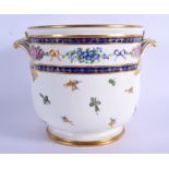 AN 18TH CENTURY FRENCH SEVRES PORCELAIN CACHE POT painted with flowers. 18 cm x 20 cm.