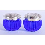 TWO SILVER TOPPED BRISTOL BLUE JARS. 4.5 cm wide.