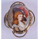 AN ANTIQUE PORCELAIN BROOCH. 3 cm x 4 cm.