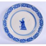 A LARGE 19TH CENTURY CONTINENTAL BLUE AND WHITE DISH sponge decorated with a Chinaman. 33 cm diamete